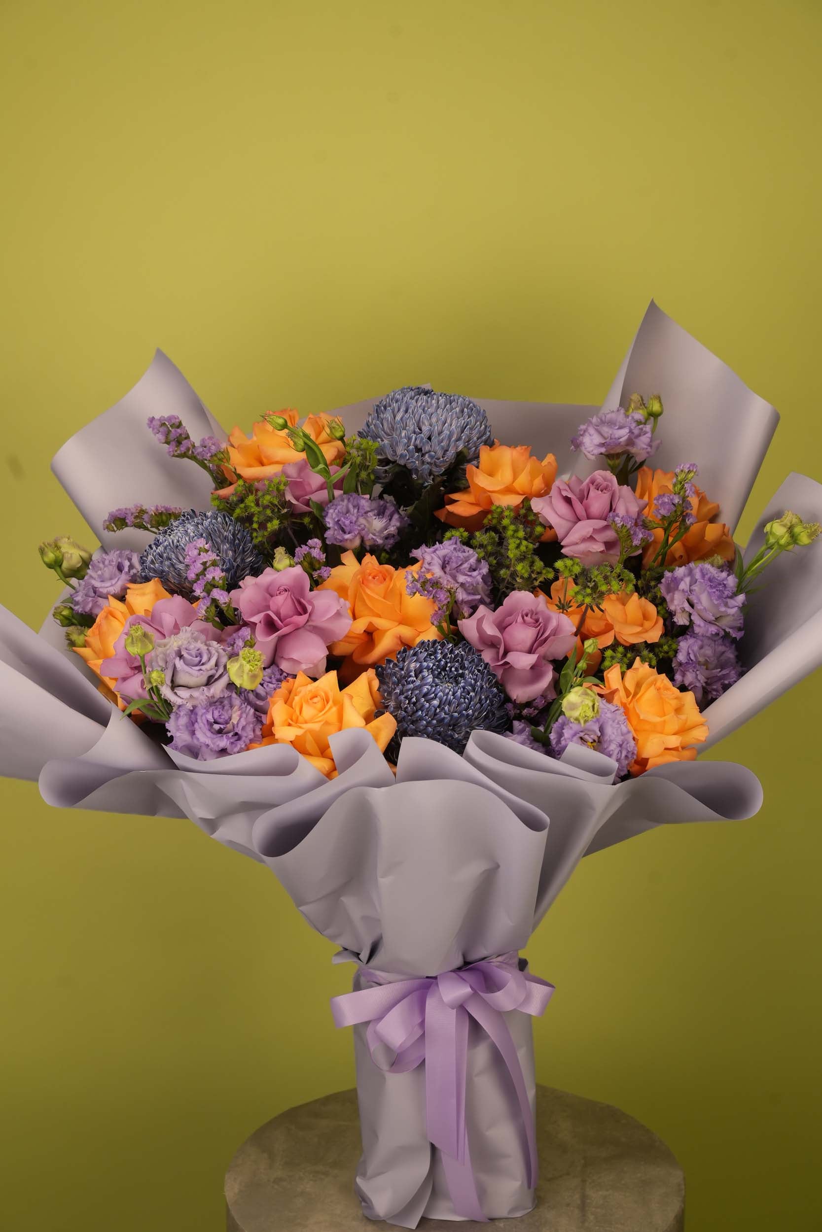 Twilight Bloom – Orange Rose & Lavender Lisianthus Floral Bouquet